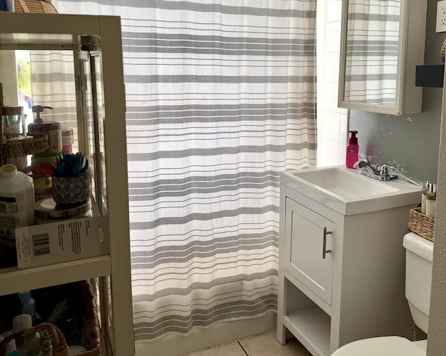 full bathroom with tile patterned flooring, vanity, shower / bath combination with curtain, and toilet