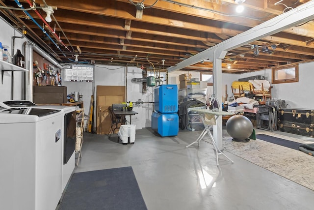 basement with washing machine and dryer