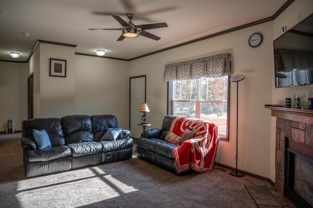 living room with ceiling fan, ornamental molding, and carpet