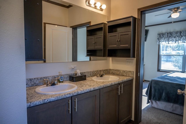 bathroom featuring vanity and ceiling fan