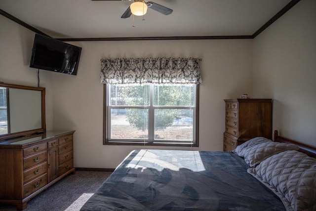 bedroom with ornamental molding, carpet, and ceiling fan