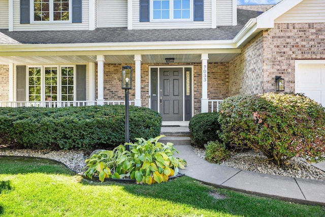 property entrance featuring covered porch