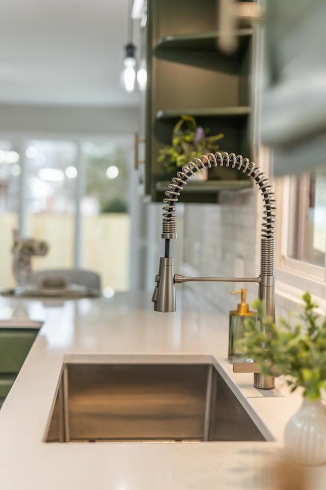 details with tasteful backsplash and sink