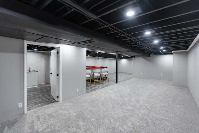 basement with carpet floors