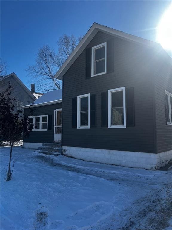 view of snow covered property