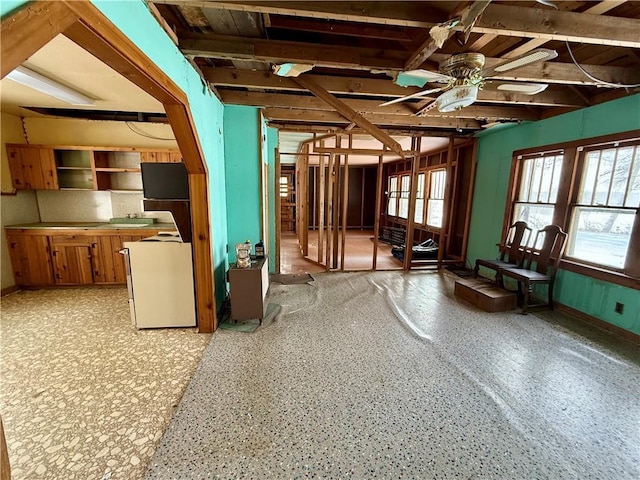 miscellaneous room featuring ceiling fan