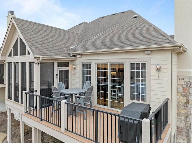 wooden deck with area for grilling