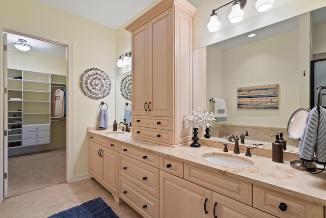 bathroom featuring vanity and tile patterned flooring