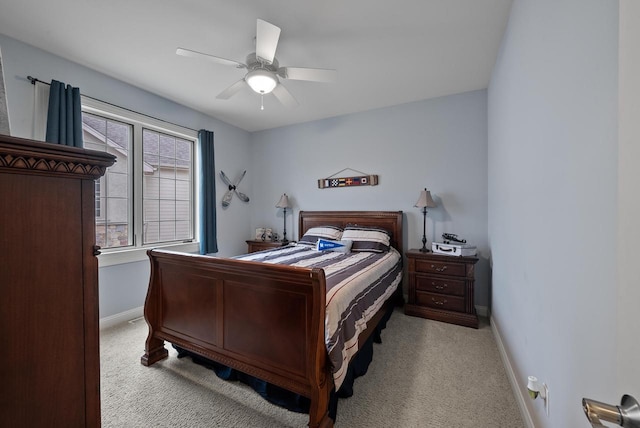 bedroom with light colored carpet and ceiling fan