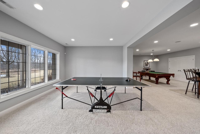 recreation room with light colored carpet and billiards