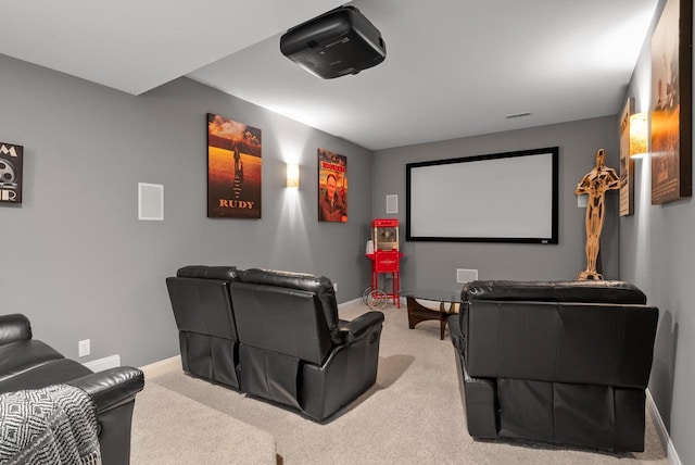 home theater with light carpet