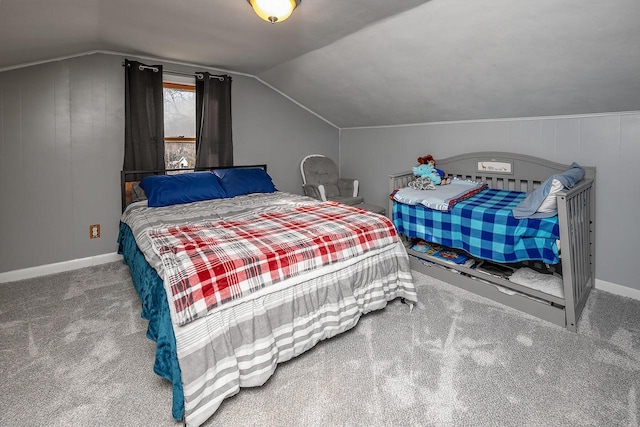 carpeted bedroom featuring lofted ceiling