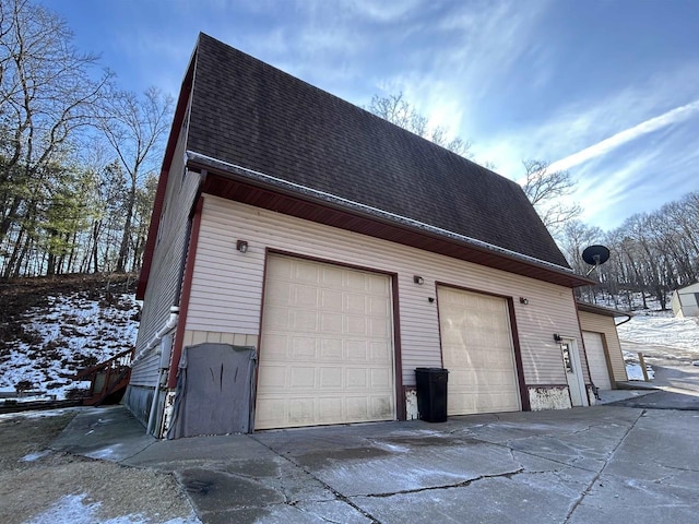 view of snow covered garage