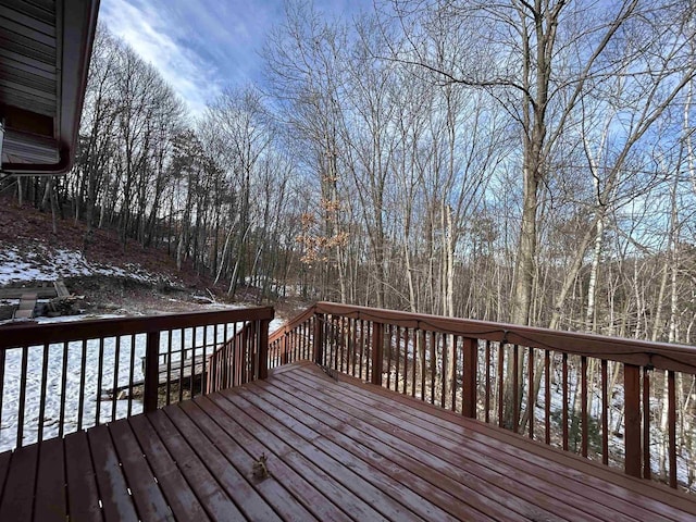 view of snow covered deck