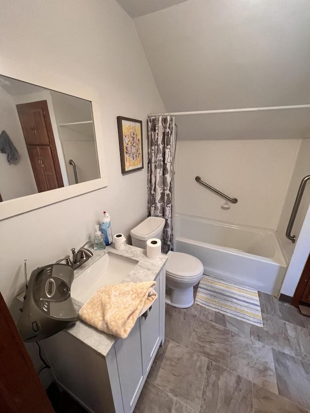 full bathroom featuring vanity, shower / tub combo, vaulted ceiling, and toilet