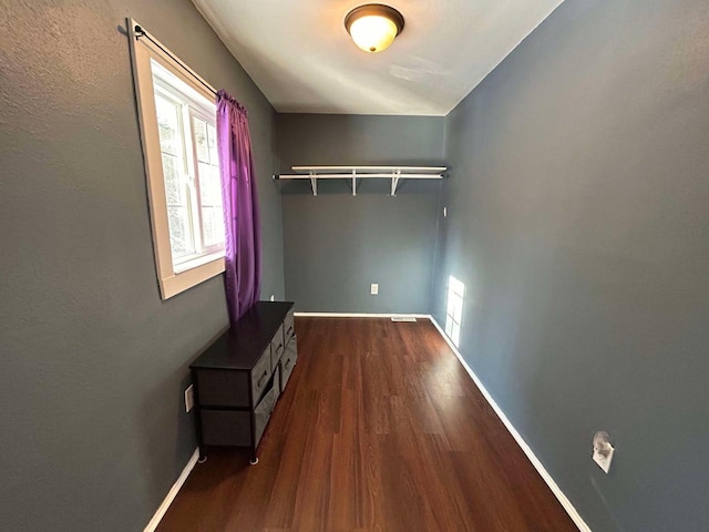 interior space with dark hardwood / wood-style flooring