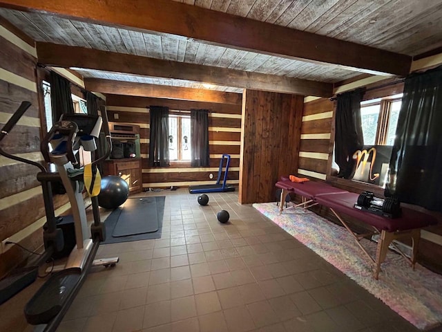 workout room with wood ceiling, tile patterned flooring, and wood walls