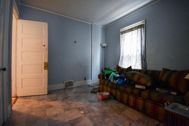 living room with ornamental molding