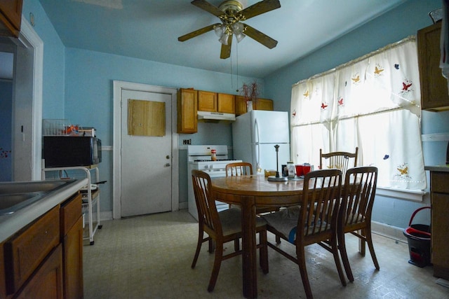 dining space with ceiling fan