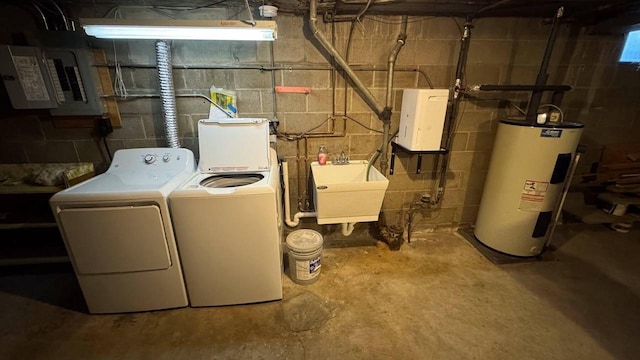 laundry area featuring water heater, separate washer and dryer, sink, and electric panel