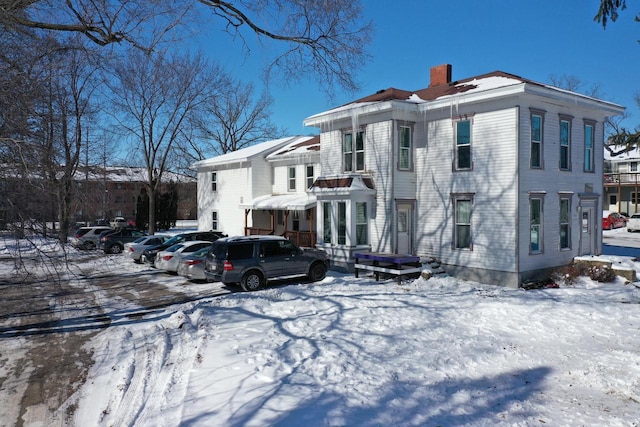 view of front of property with a chimney