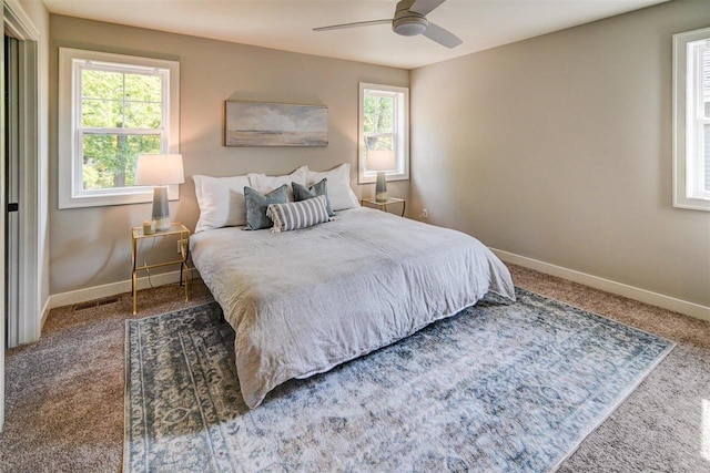 bedroom featuring ceiling fan and carpet flooring