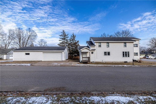 front of property with a garage