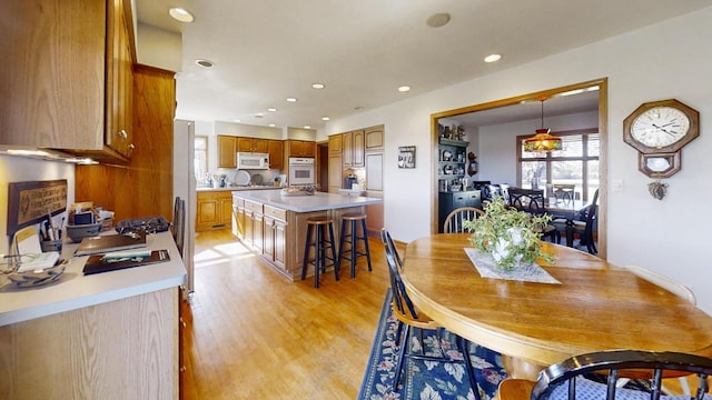 dining room featuring light hardwood / wood-style floors