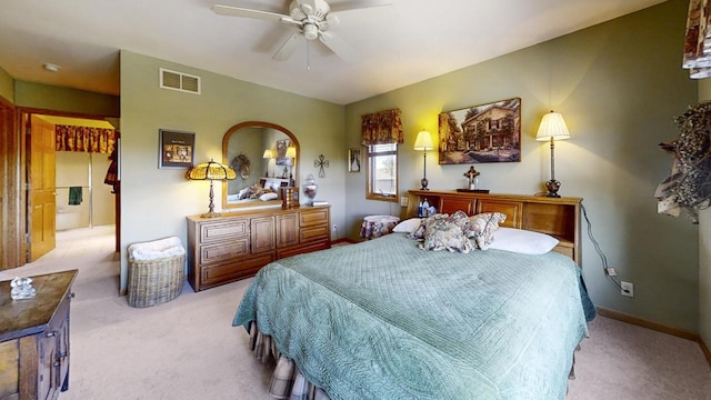 bedroom featuring light carpet and ceiling fan