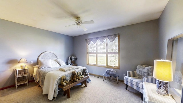 bedroom with ceiling fan and carpet