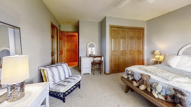 carpeted bedroom featuring a closet