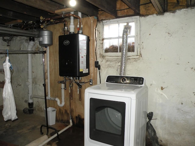 301 W Amelia St, Cassville, WI 53806 - washroom with water heater and washer / dryer