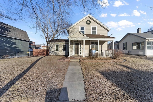 view of front of property featuring covered porch