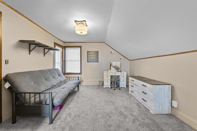 living area with lofted ceiling, ornamental molding, and carpet