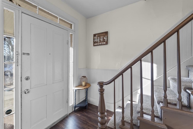 entryway with dark hardwood / wood-style flooring