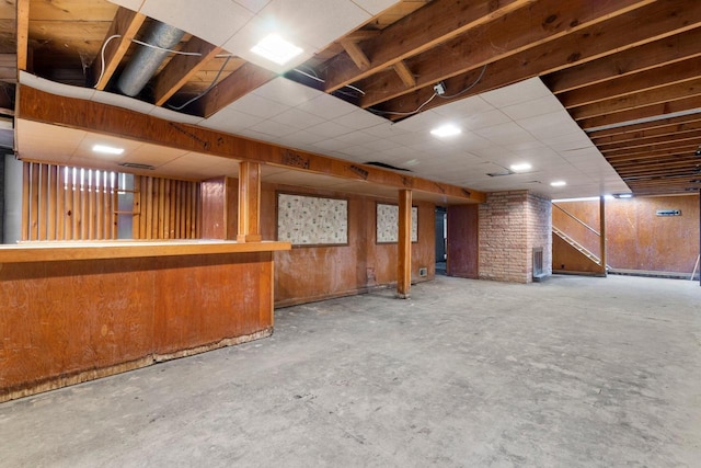 basement with wooden walls