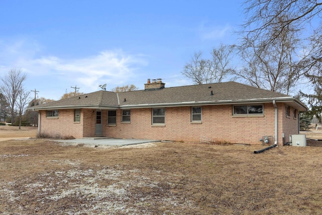 back of house with a patio