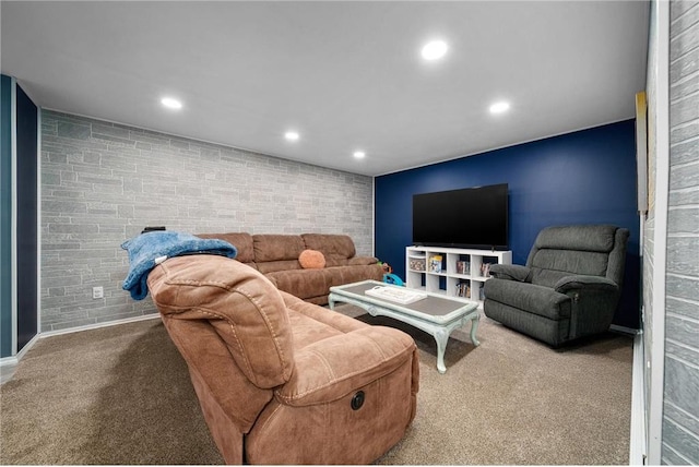 living room with brick wall and carpet floors