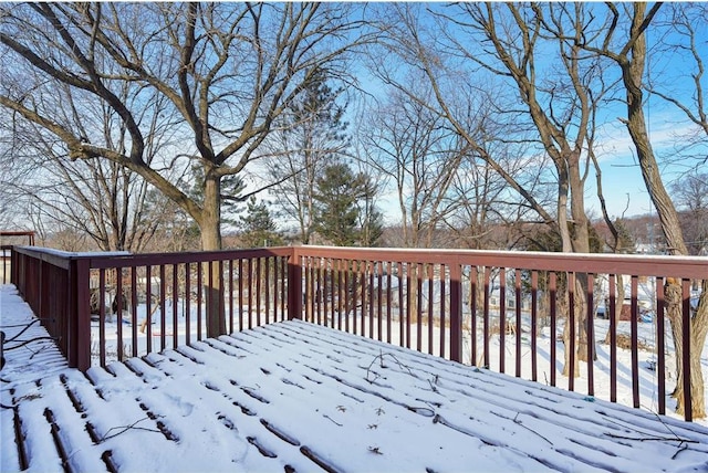 view of snow covered deck