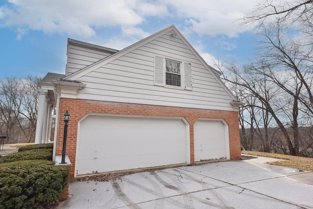 view of property exterior with a garage