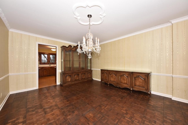 unfurnished dining area featuring ornamental molding, dark parquet flooring, and a notable chandelier