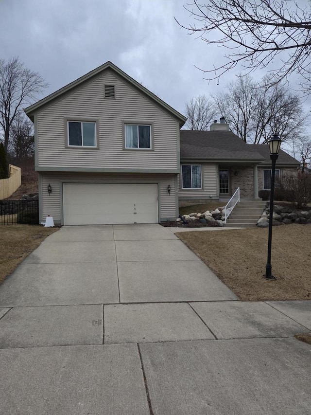 split level home with a garage