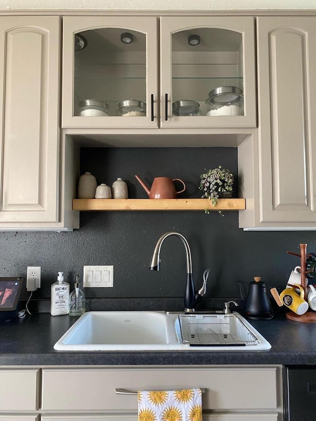 kitchen with sink and white cabinets