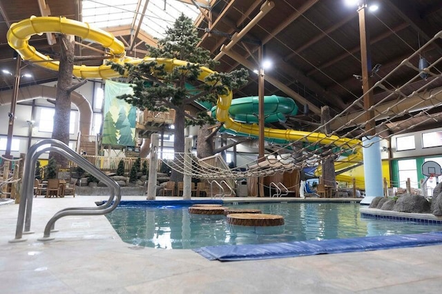 view of swimming pool featuring a water slide