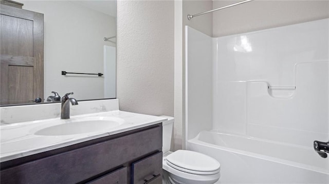 full bathroom featuring shower / tub combination, vanity, and toilet