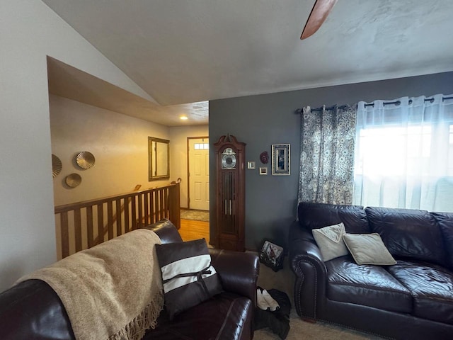 living room featuring vaulted ceiling