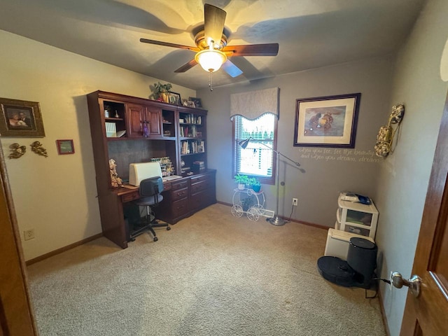 home office with light colored carpet and ceiling fan