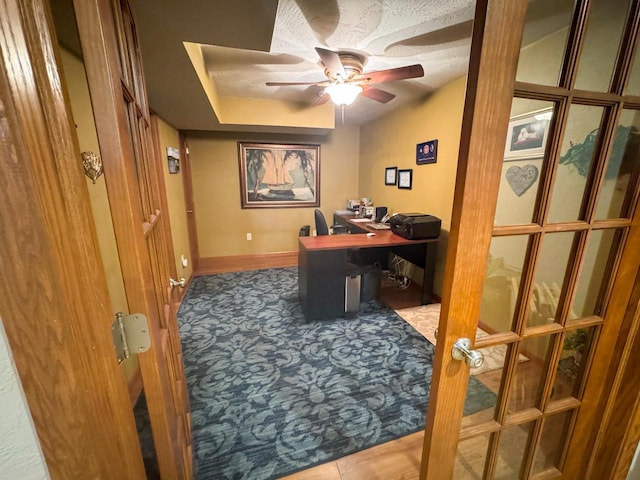 office featuring french doors and ceiling fan