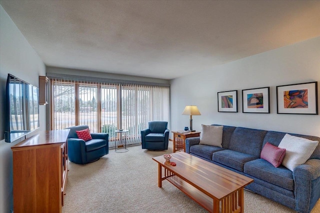 living room featuring light colored carpet