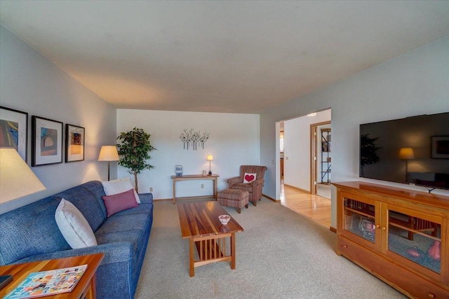 living room featuring light carpet